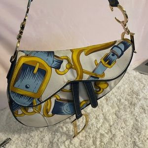 Christian Dior
Vintage Denim Embroidered Canvas Saddle Bag